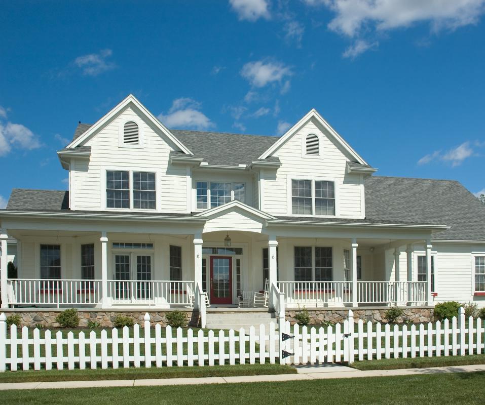 A house with a picket fence.